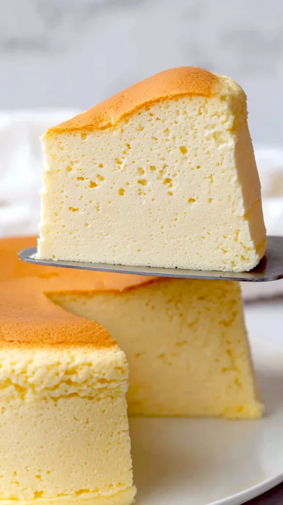 Japanese cotton cheesecake, slice lifted