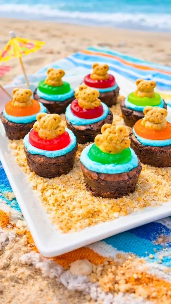 mini brownie bites, icing, Teddy Graham, gummy ring candy, beach snacks